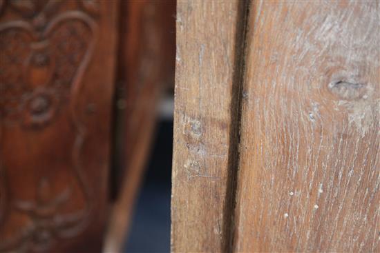 A 17th century oak Wainscot chair, W.2ft 2in. H.3ft 8in. incorporating later timbers